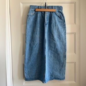 Vintage Y2K High-waisted, midi denim skirt with a retro vibe.
